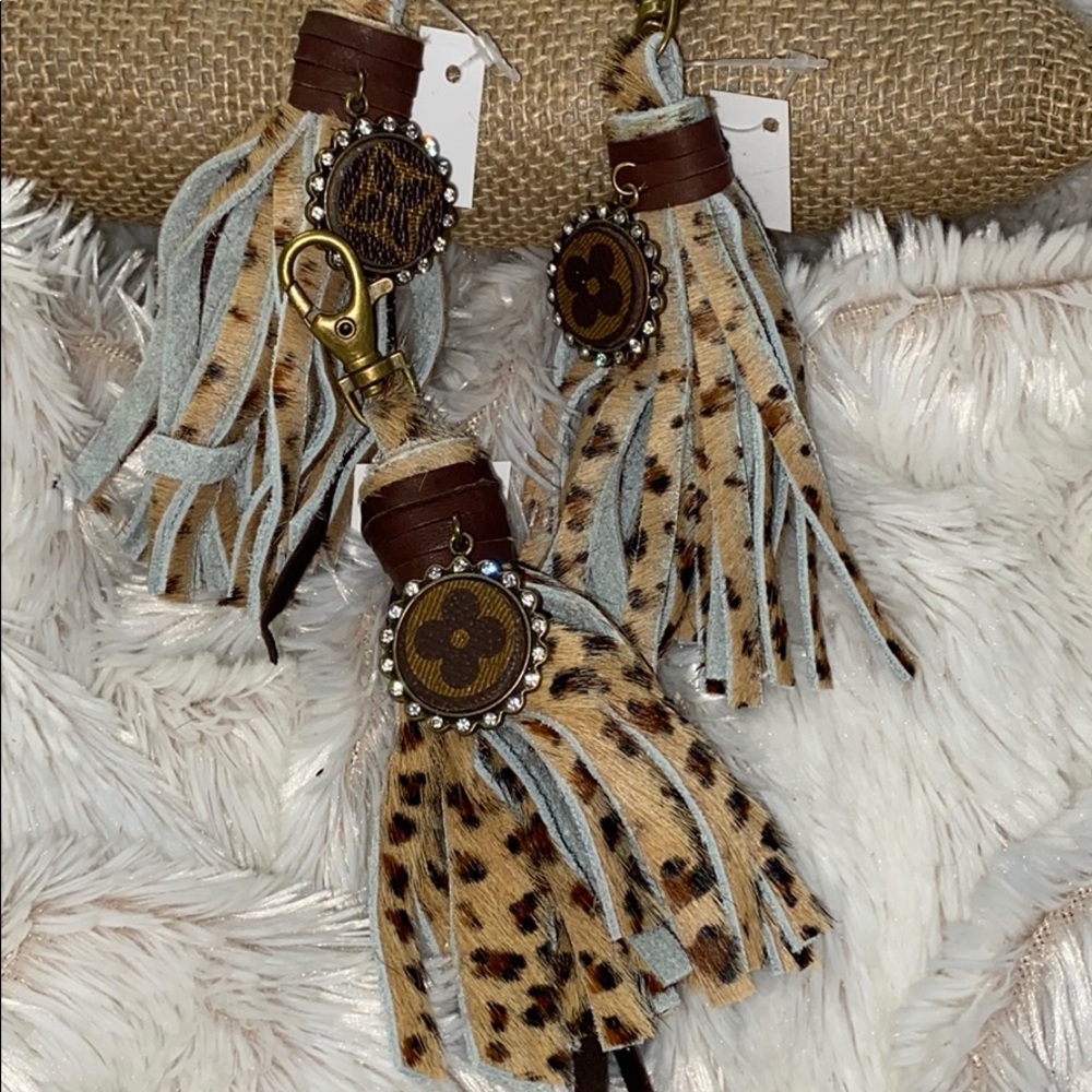 NWT Leather Tassel Clip-On with Bling Medallion